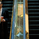 Steve Mnuchin takes the automated stairs. Photo: Getty